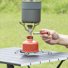 MSR Universal Canister Stand adjustment system fits most canisters quickly for flexible outdoor setups.