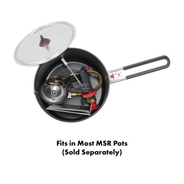 MSR WhisperLite International shown with stainless steel legs for stable, lightweight cooking.