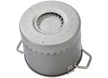 MSR WindBurner pot nesting beside stove system for compact backpacking
