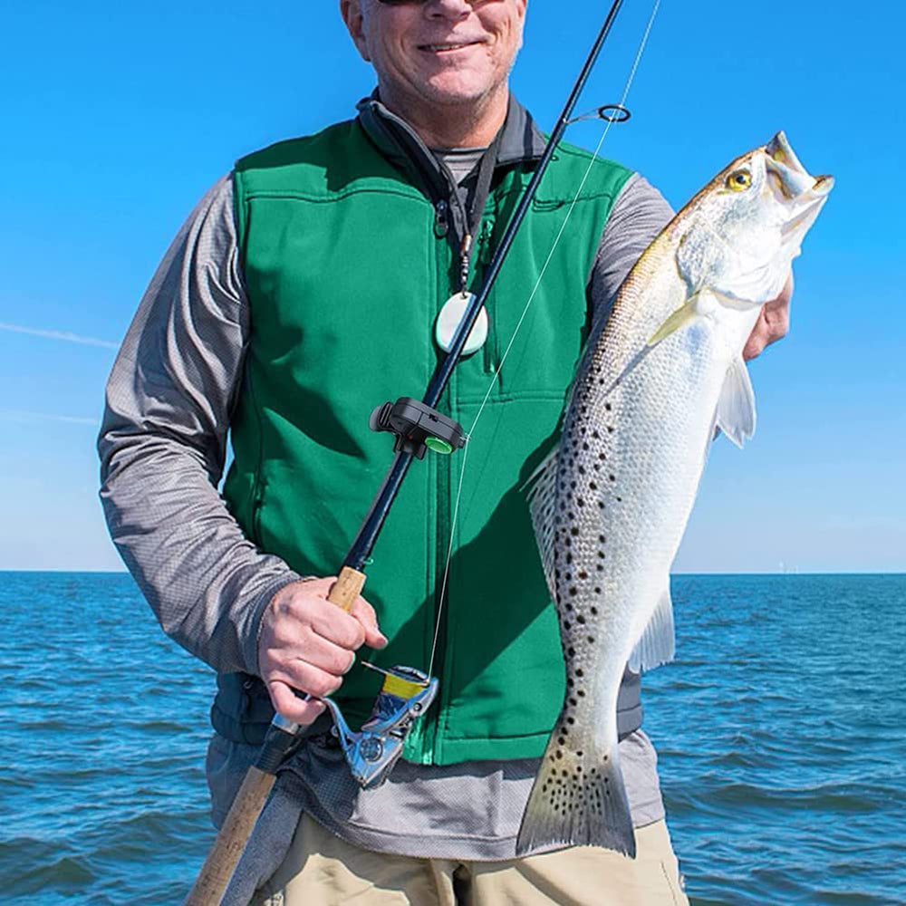 Bite alarm clipped to fishing rod setup