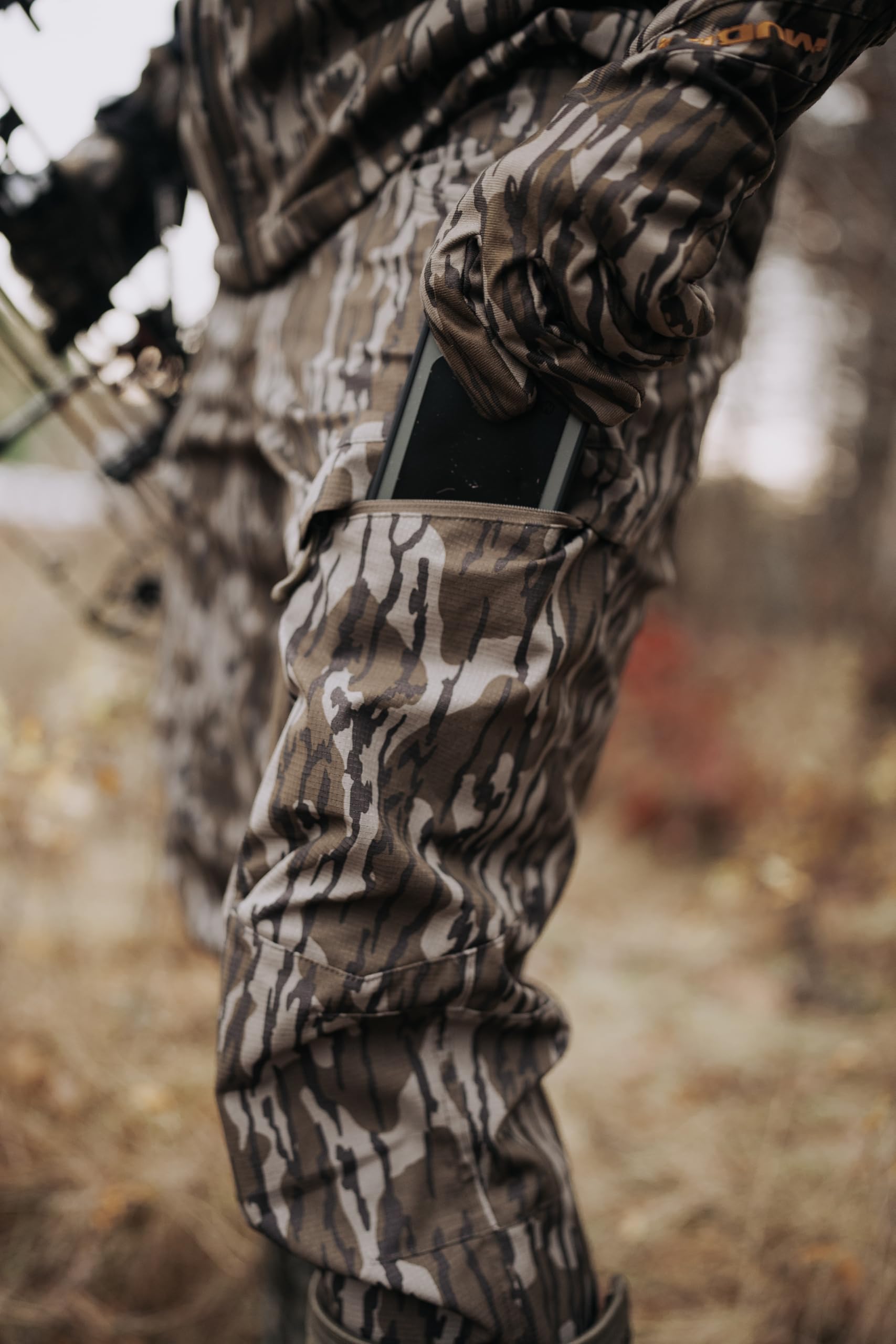 Muddy DV8 Clutch Pants silhouette image shows tapered legs for stealthy movement