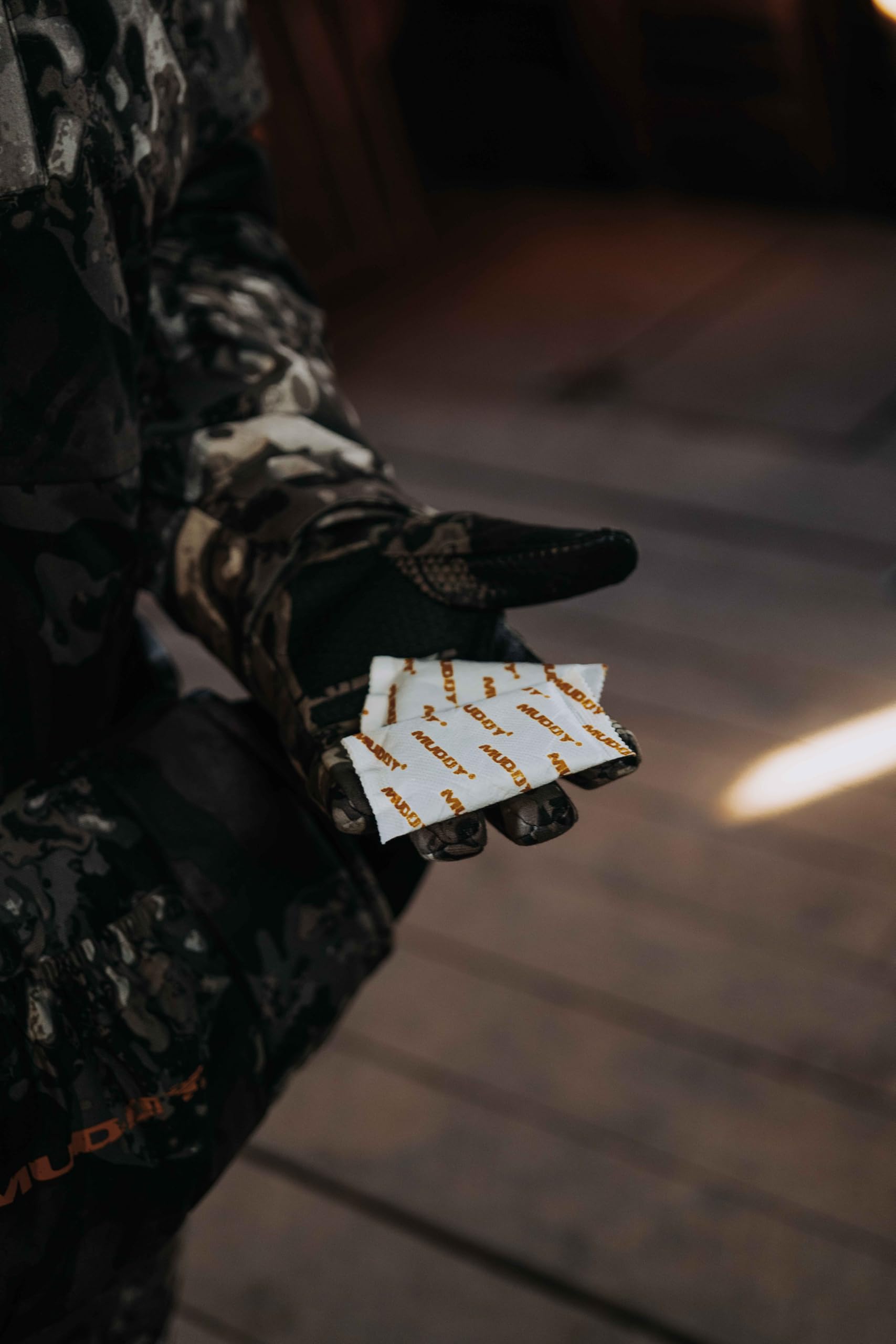 MUDDY zippered back pocket offers secure storage during activities