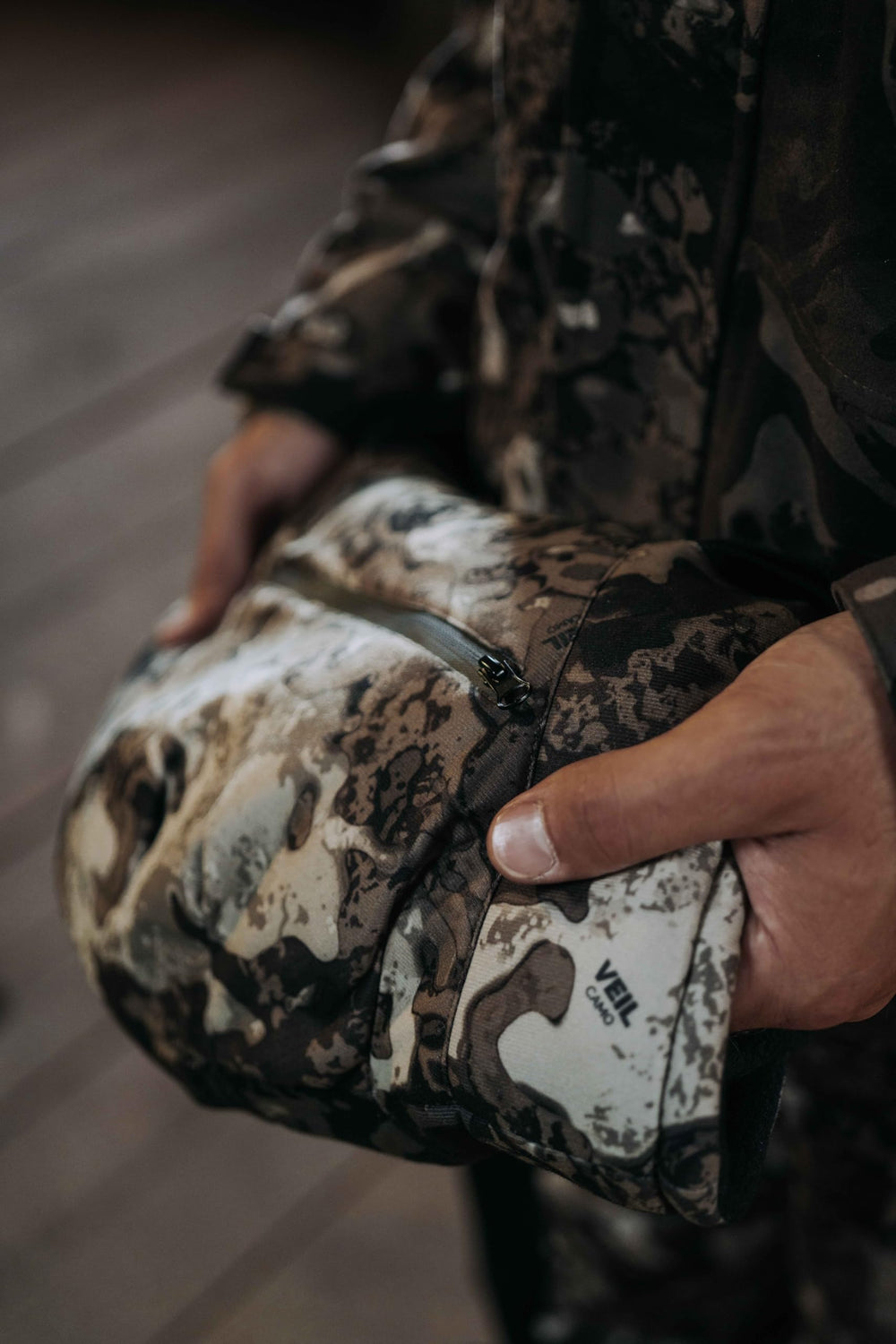 MUDDY elasticized front pocket for quick-access storage