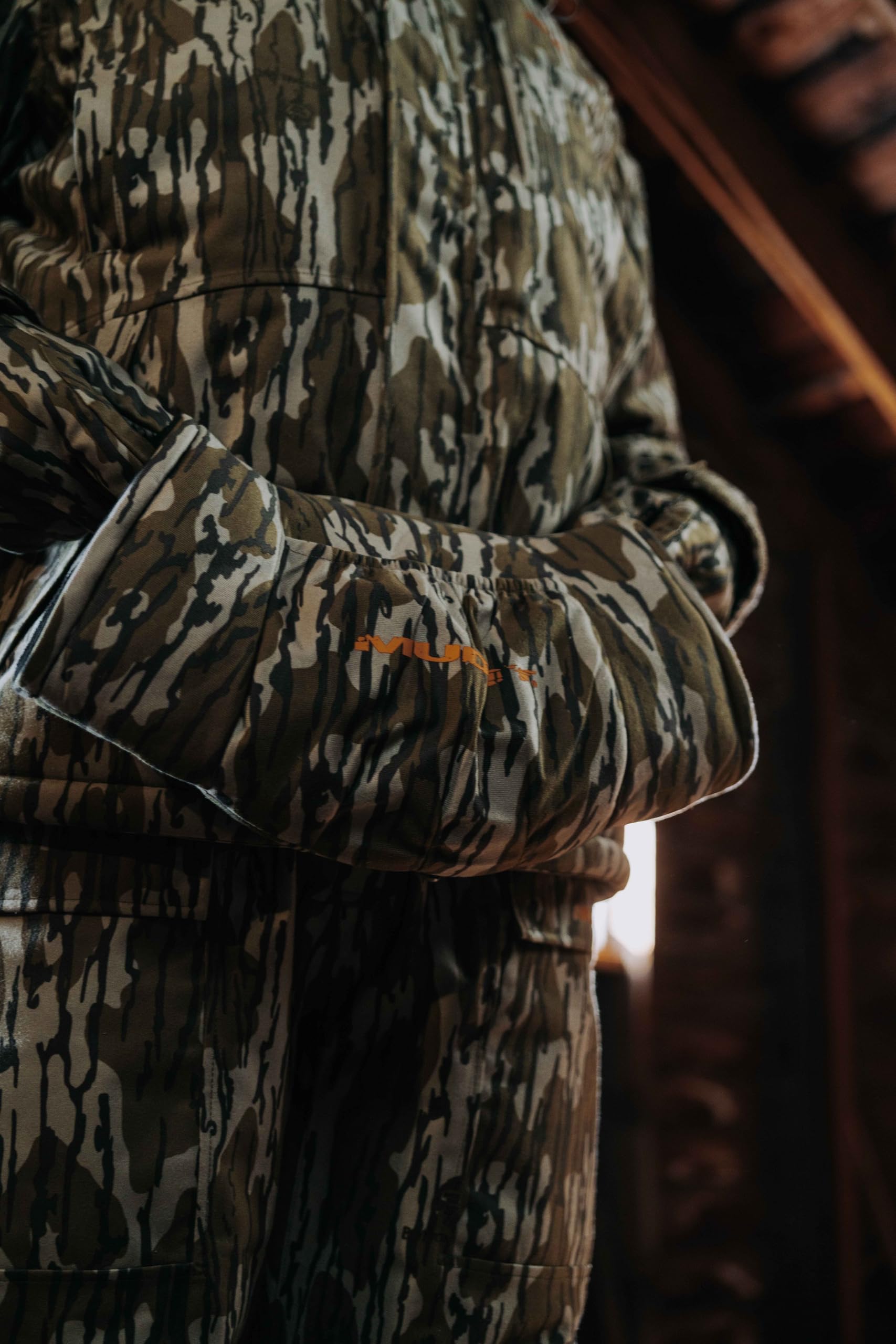 MUDDY Insulated Hand Muffs back pocket visible for secure storage.