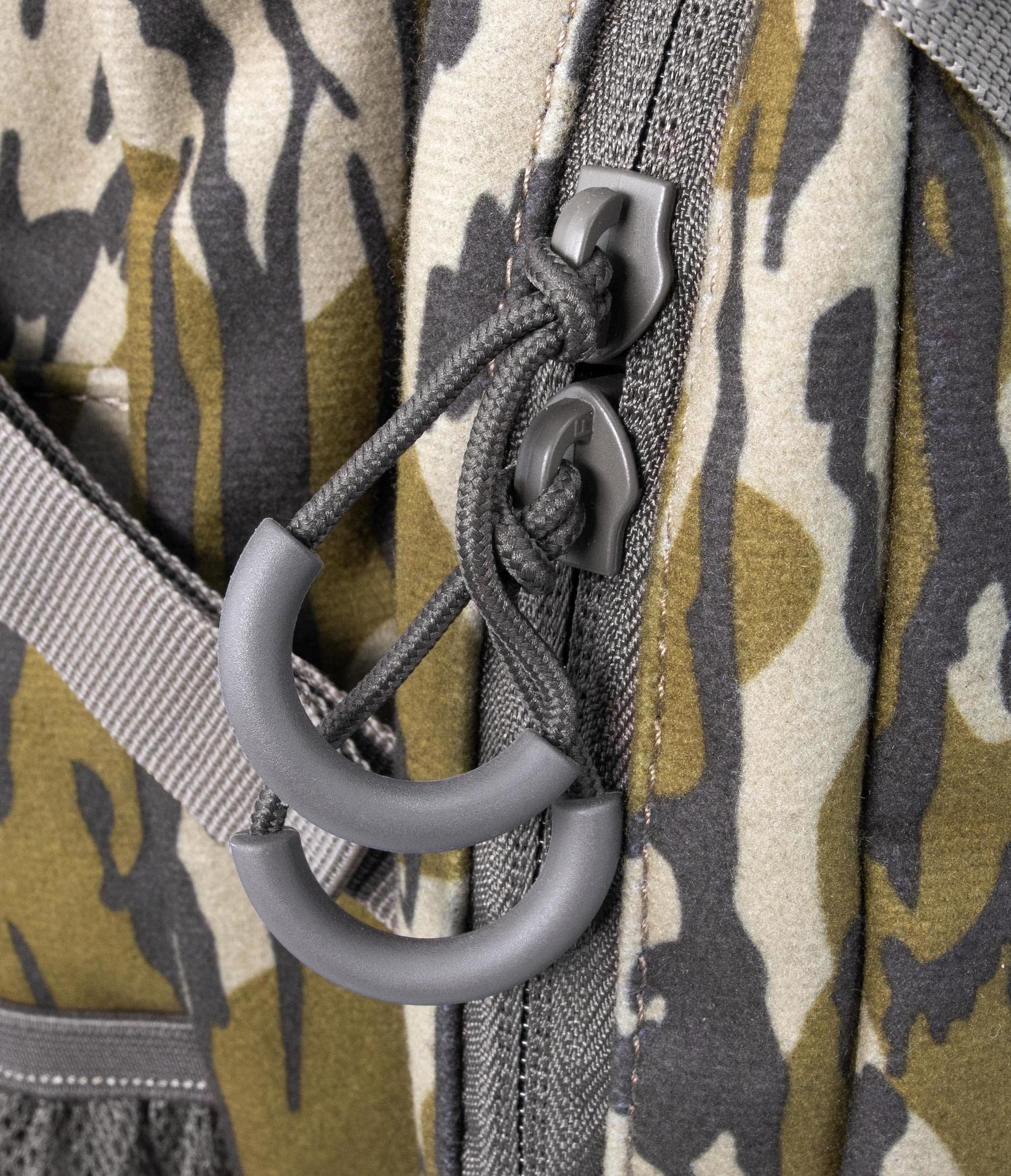 MUDDY Pro 500 lumbar pack zipperless lid enables quiet lid access.