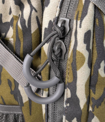 MUDDY Pro 500 lumbar pack zipperless lid enables quiet lid access.