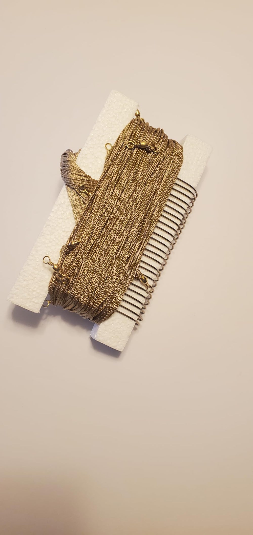 Muddy River Trotlines 150ft mainline close-up showing durable tan braided nylon for reliable setups.