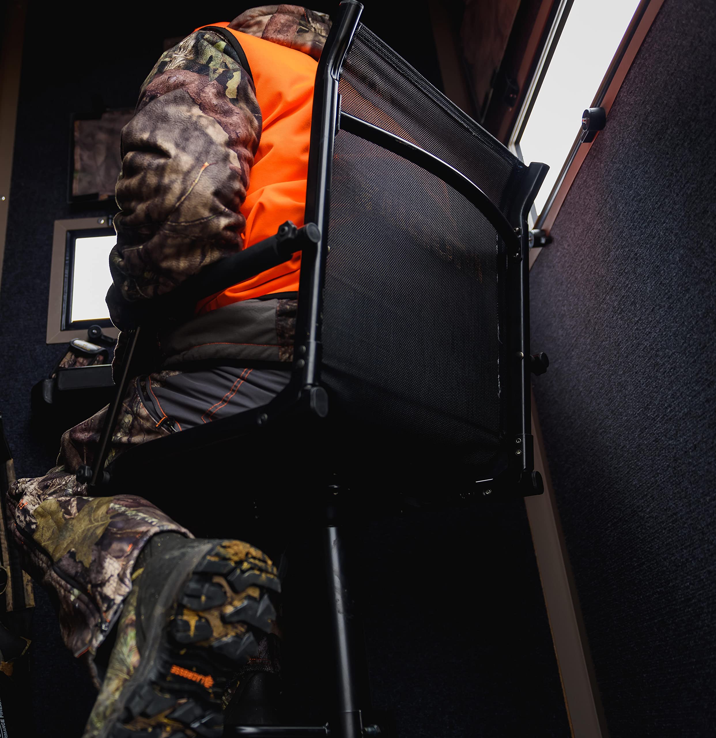 Muddy Swivel Extreme Seat in use shows 360 swivel and footrest benefits.