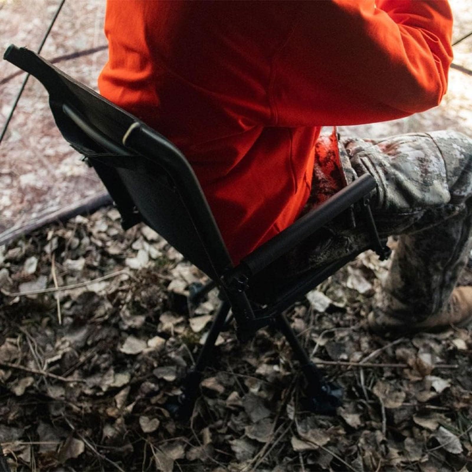 Muddy Swivel Ground Seat with removable carry strap for on-the-go transport.