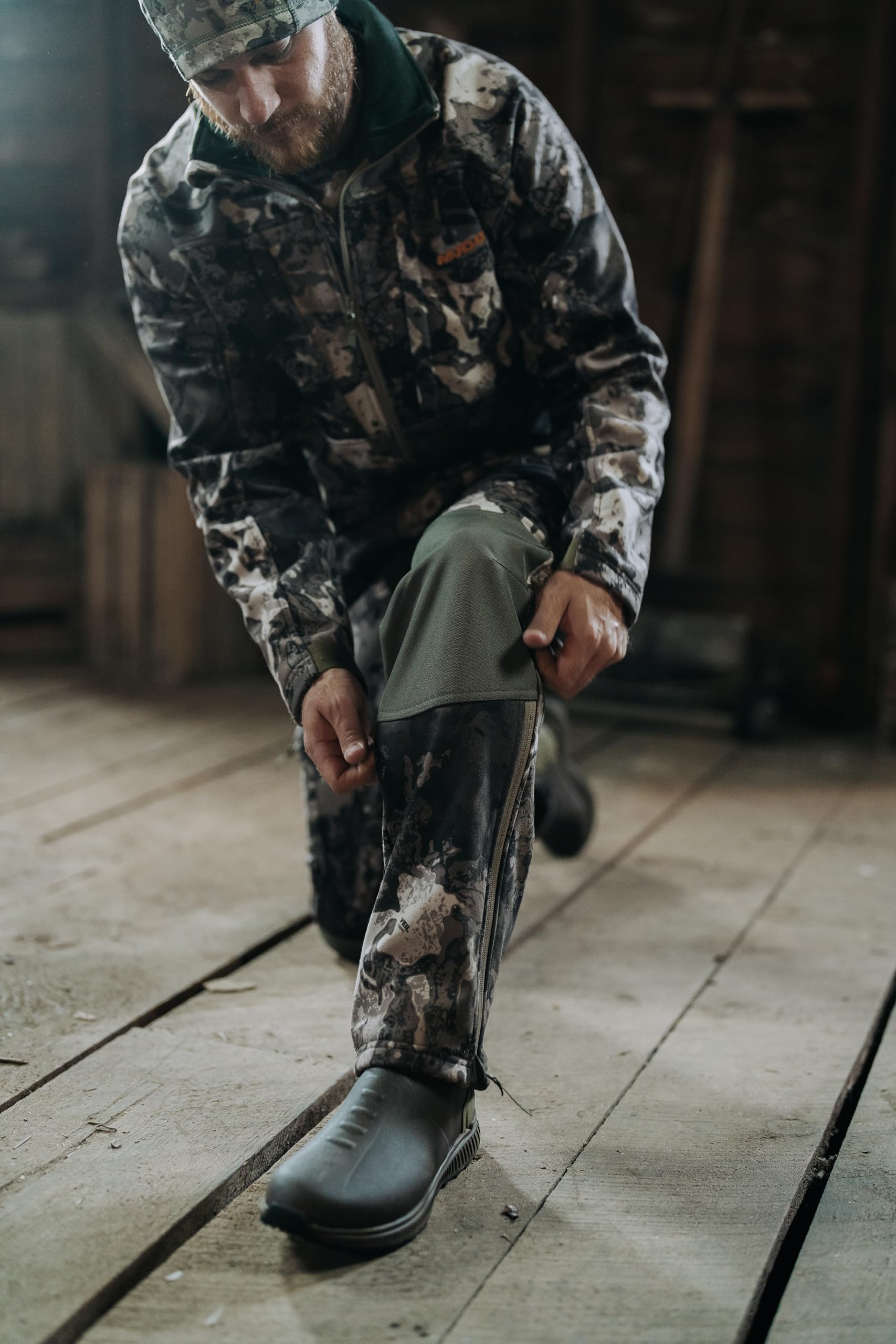 MUDDY TRX Softshell Pant features knife reinforcement pocket for tool access.