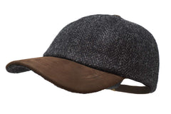 Munro Harris Tweed cap in midnight showing durable wool for all-weather wear.