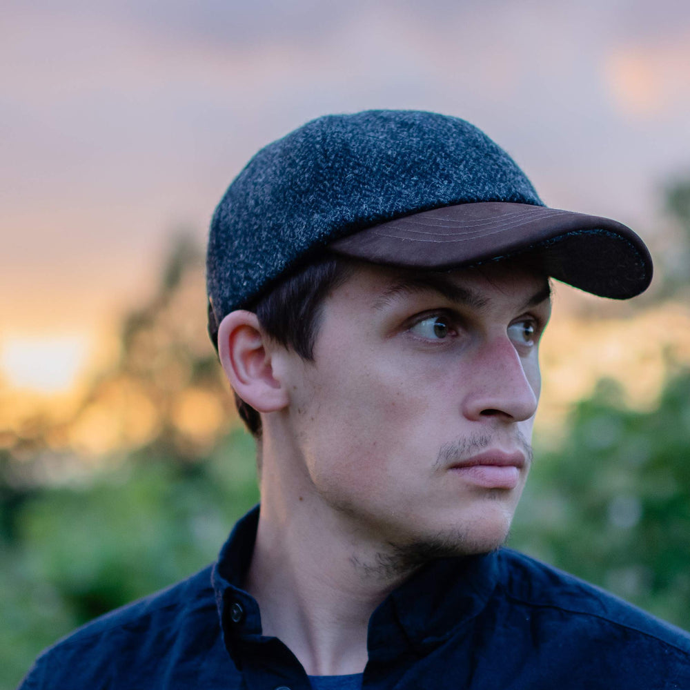 Munro cap close-up reveals nubuck leather detail and premium craftsmanship.
