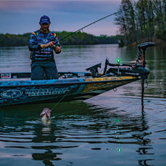 Mustad engraved 10.5g weight shows precise sizing for consistent rigs.