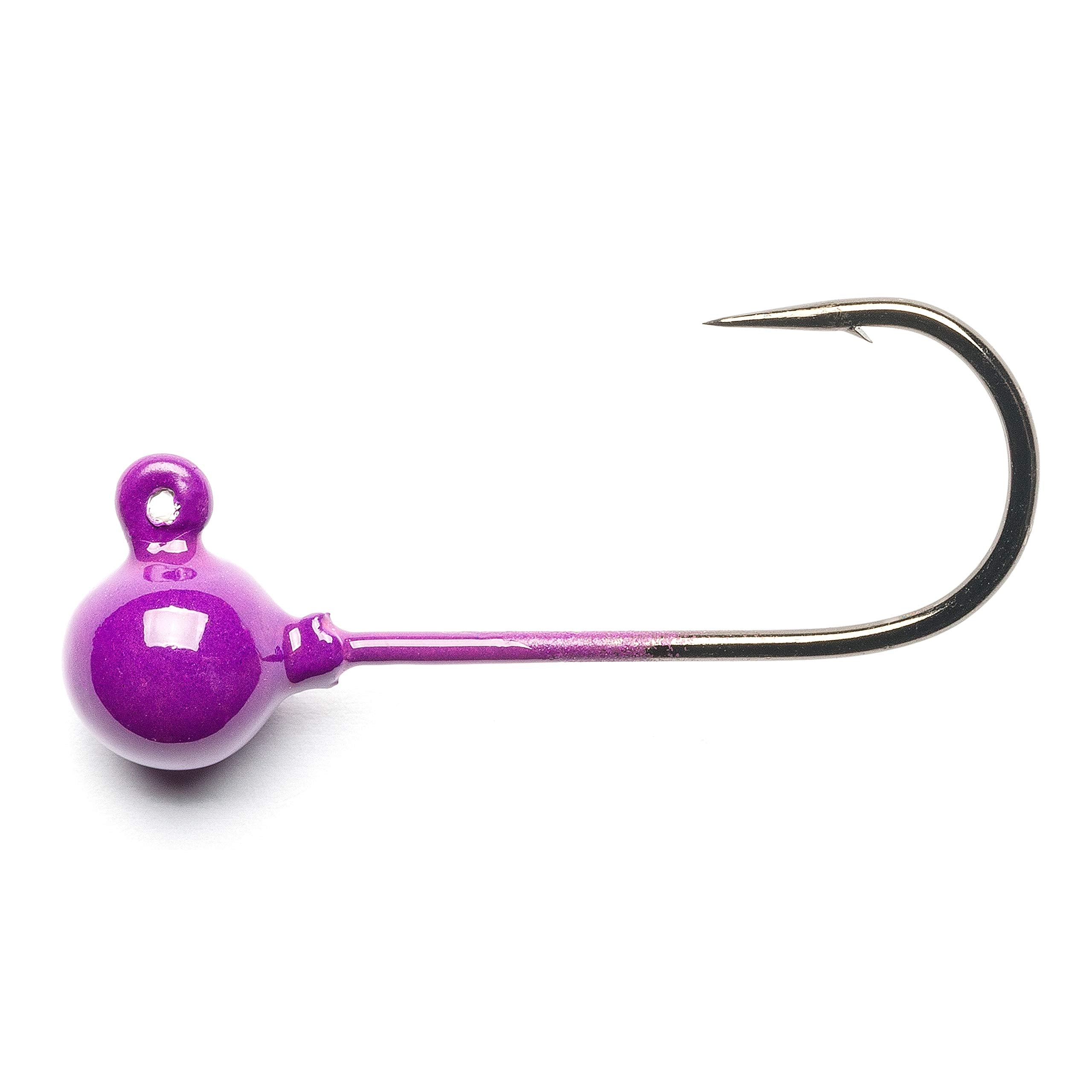 Mustad jig head purple 1/16oz in-use demonstrates lure presentation on water.
