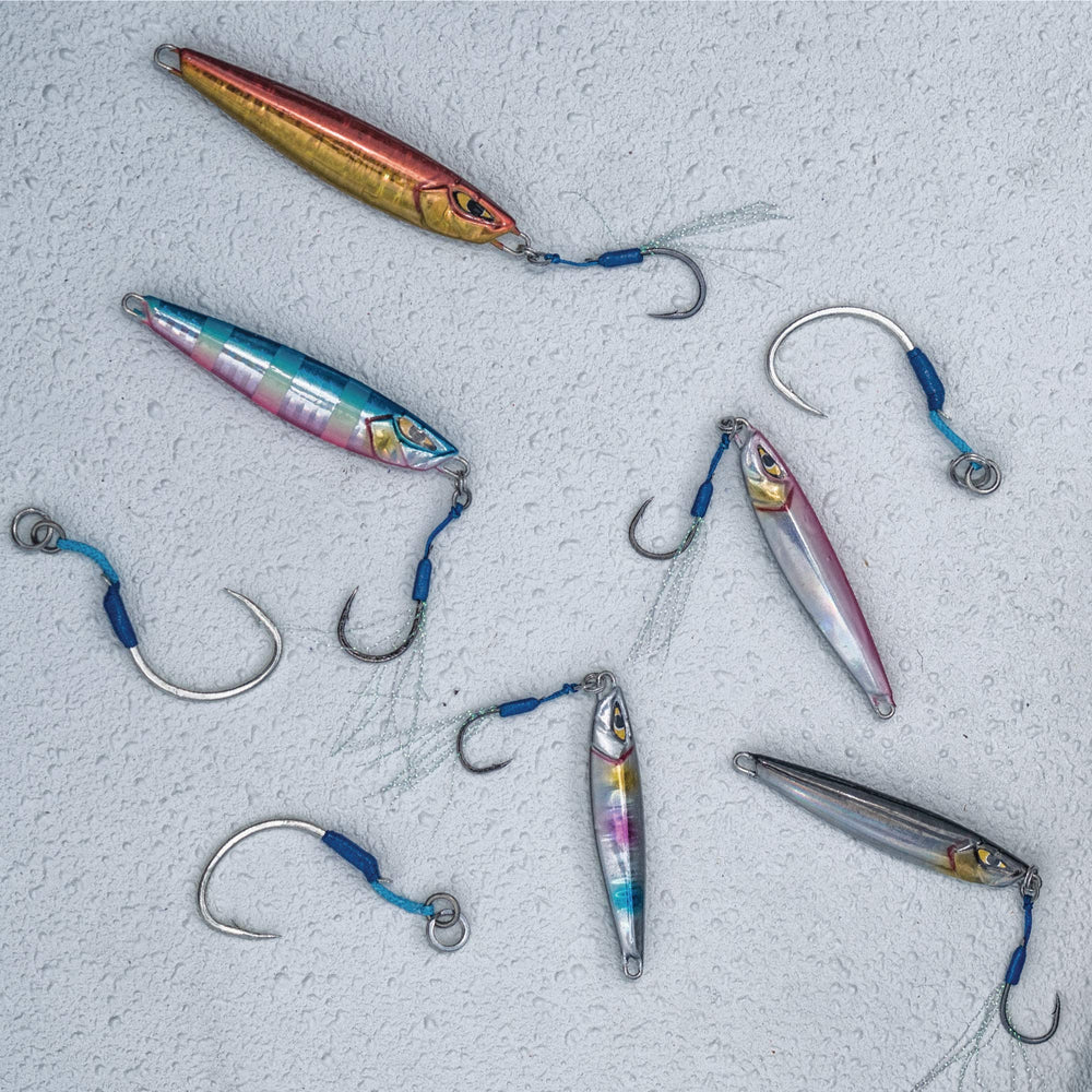 Mustad Moon Riser Jig Yellow Candy 150g in water shows slim profile slicing through water with ease.