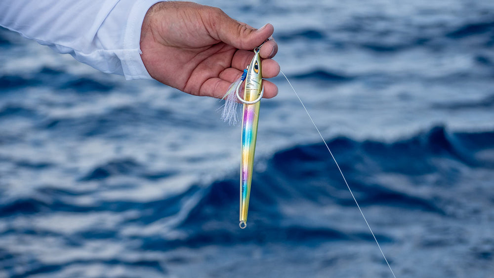 Mustad Moon Riser Jig in water action captures vertical descent and enticing jigging movement.