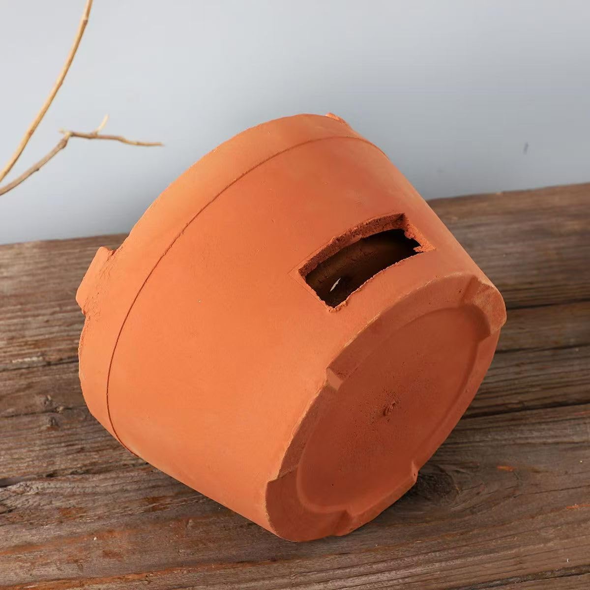 Mwpqbd Chaozhou red clay stove demonstrating barbecue oven capability for outdoor cooking.