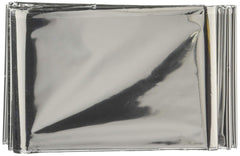 Mylar emergency thermal blanket opened shows size and reflective material for cold-weather use