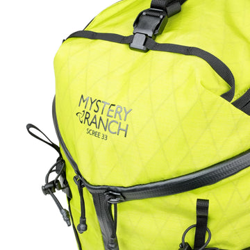 Mystery Ranch Scree 33 limeade color enhances visibility on outdoor trips.