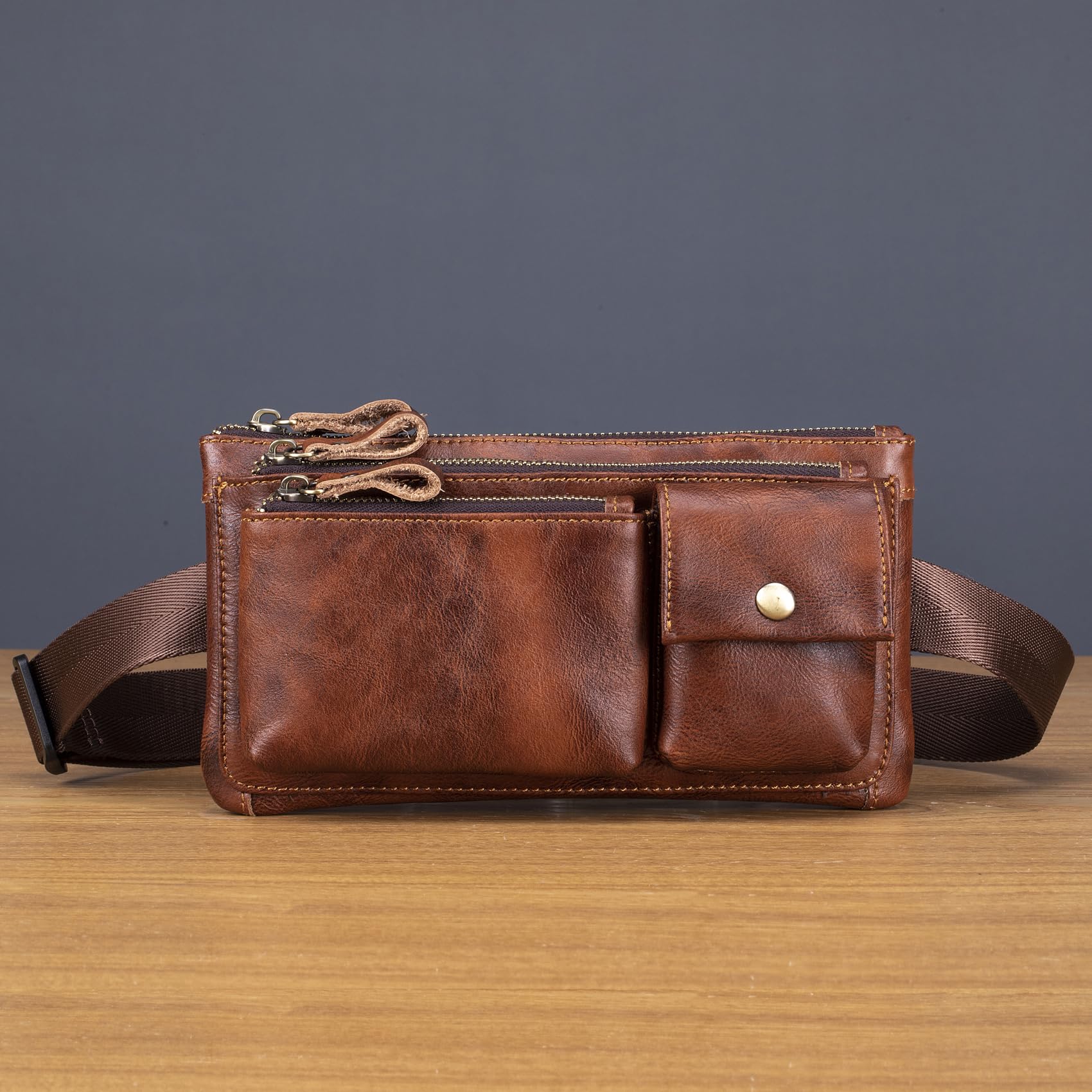 Myunxui fanny pack back view highlighting back-secure design and smooth leather texture.