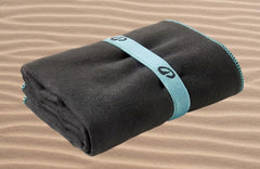 Nabaiji towel drying after swim, compact for travel.
