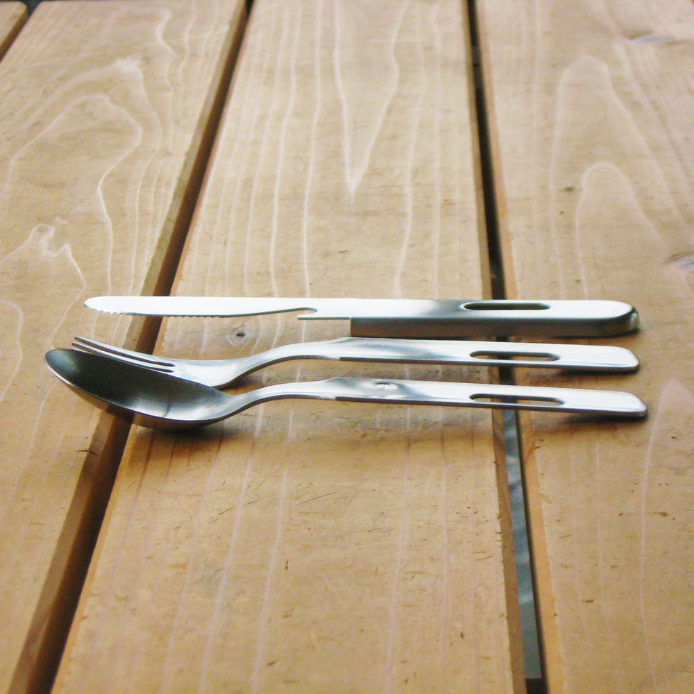 Nagao Tsubamesanjo camping knife with recess to store spoon and fork securely.