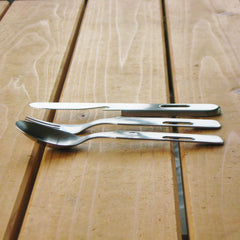 Nagao Tsubamesanjo camping knife with recess to store spoon and fork securely.