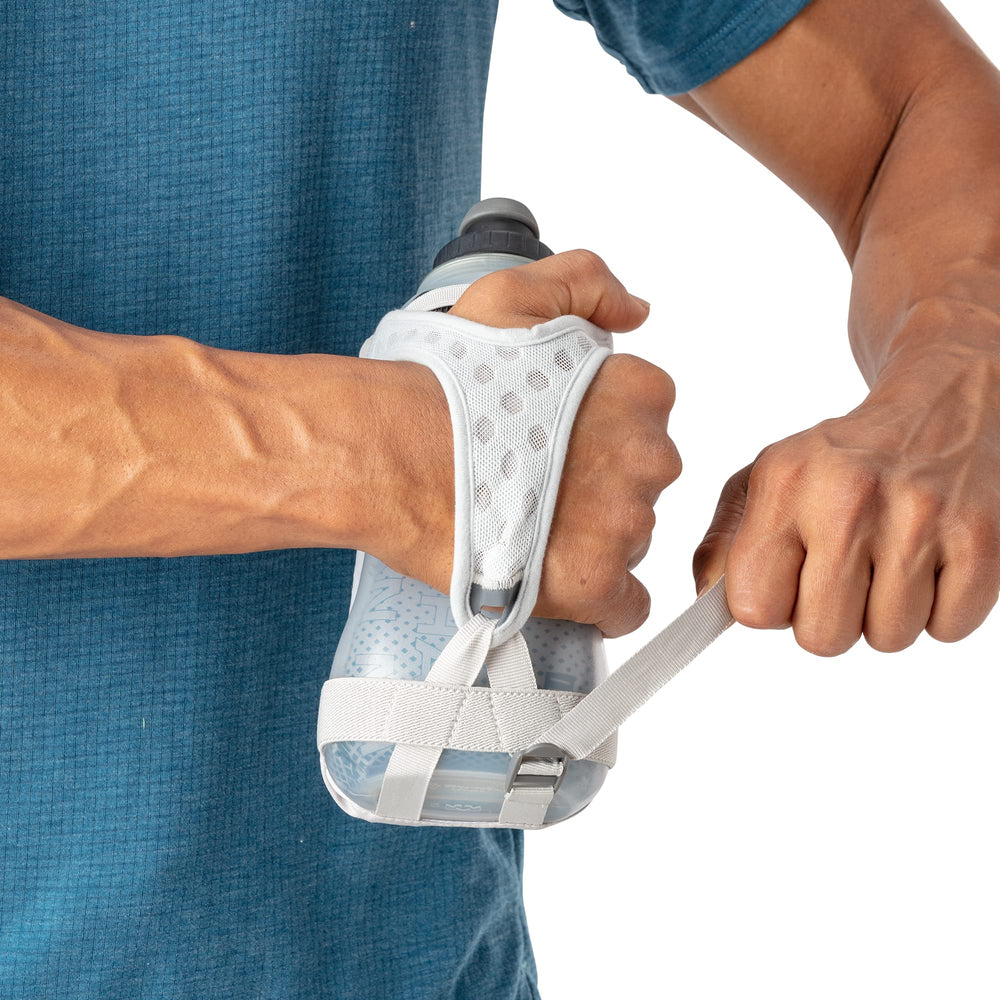 Nathan adjustable hand strap enables grip-free comfort while running.