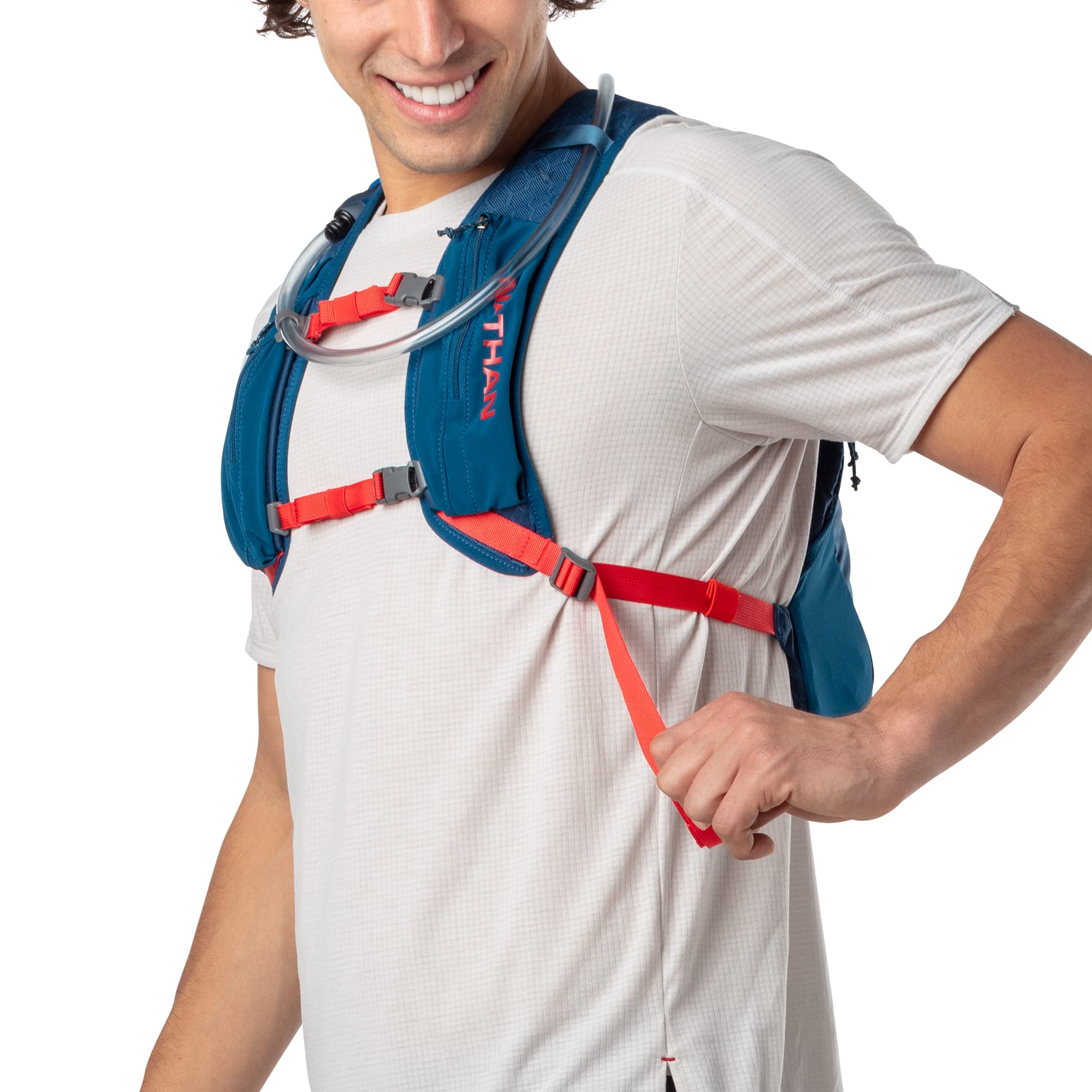Nathan Crossover Pack hot red gloss accents add visibility on trails.