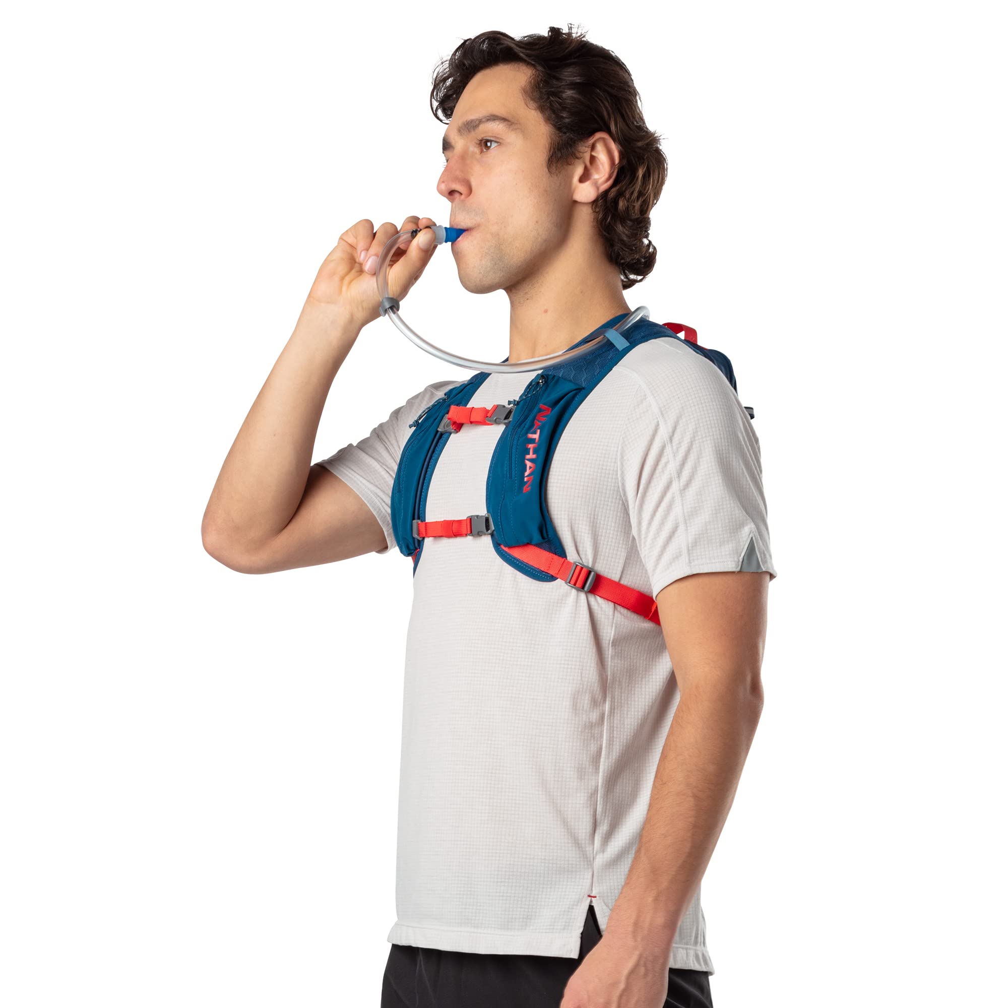 Nathan Crossover Pack hot red reflective strip enhances nighttime visibility.