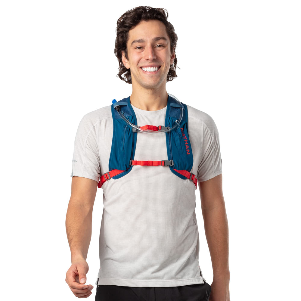 Nathan Crossover Pack hot red zip closures secure essentials during workouts.