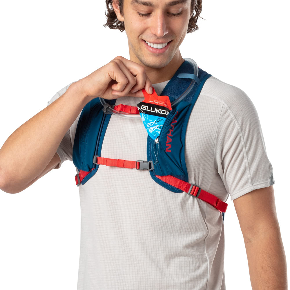 Nathan Crossover Pack marine blue water bottle holder keeps fluids handy.