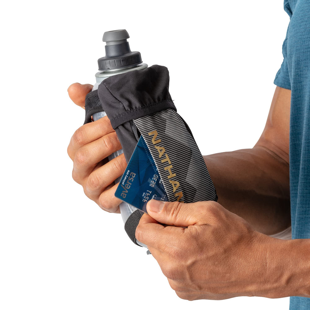 Nathan front-pocket storage fits keys or cards for quick access.