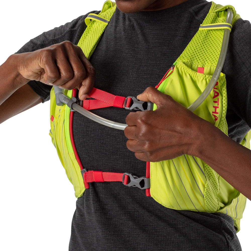 Nathan Pinnacle 12L hydration pack in action on trail during run