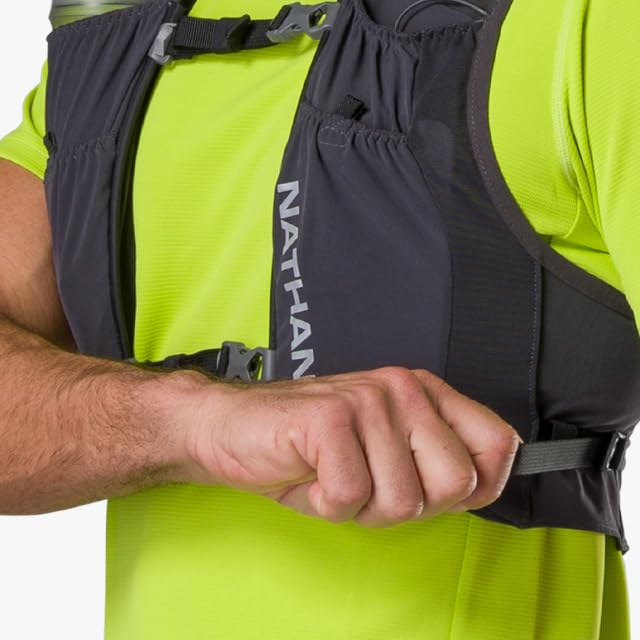 Nathan Pinnacle FeatherLite on a trail highlighting secure fit and mobility.