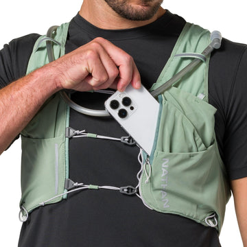 Nathan Pinnacle Pro 12L vest with diagonal zip pocket for extra storage.
