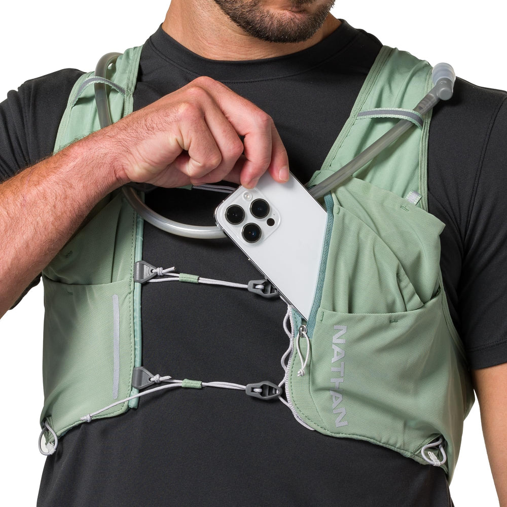 Nathan Pinnacle Pro 12L vest pole keepers for stable trekking poles.