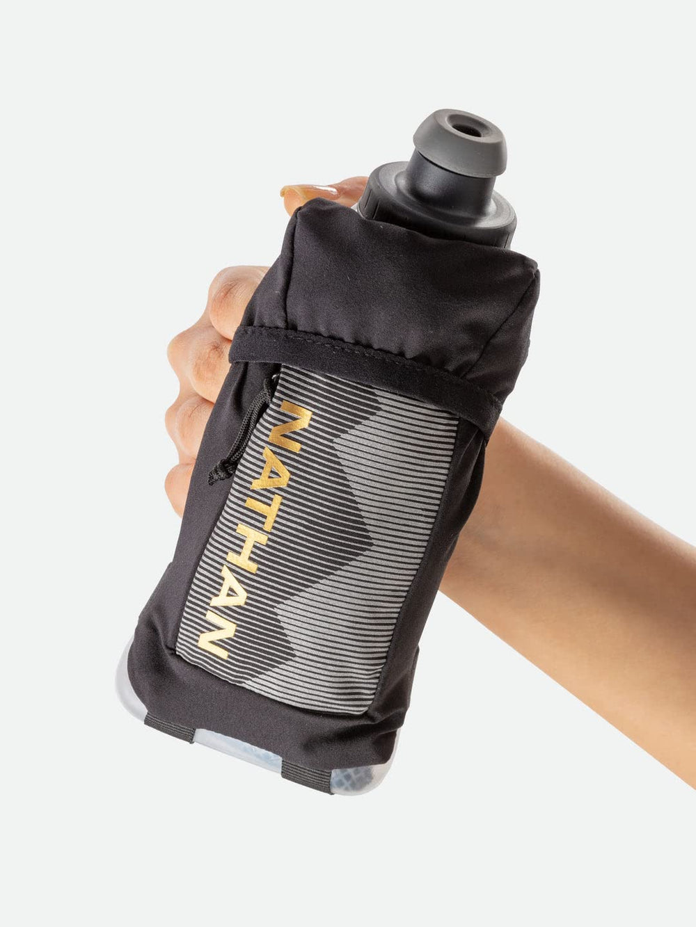 Nathan Running Handheld 360 reflective surface enhances visibility in low light.