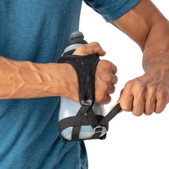 Nathan Running Handheld Quick Squeeze 18oz bottle provides larger capacity for long runs.