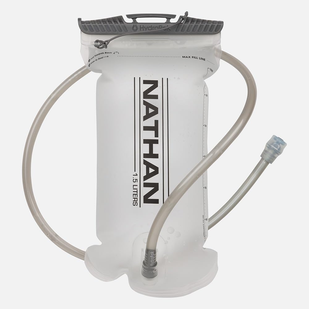 Nathan TrailMix bottle pockets demonstrate secure 22 oz hydration while running