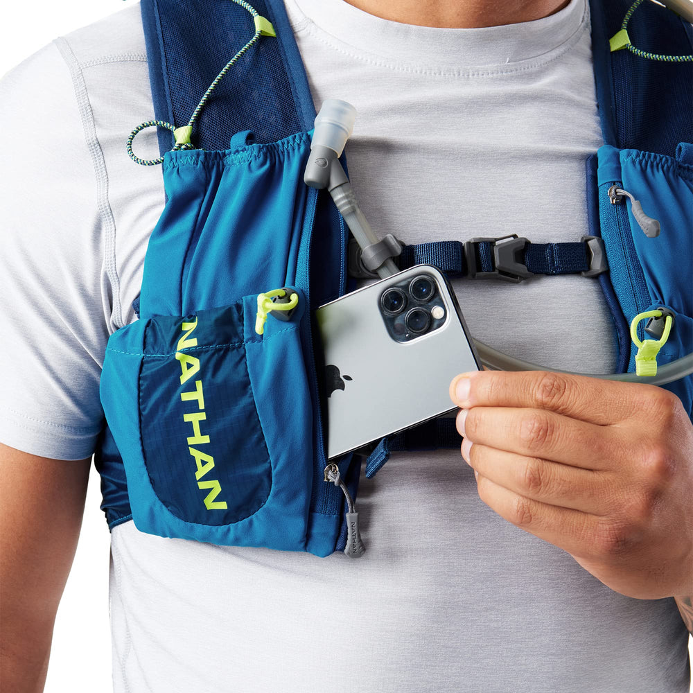 Nathan Vapor Air 3.0 front bottle pocket fits up to 22 oz flasks for hydration on the go.