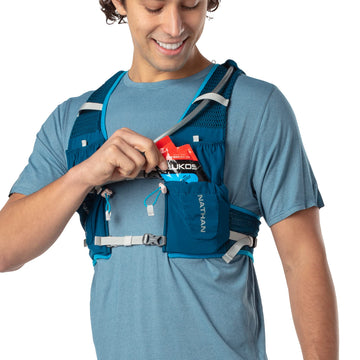 Nathan VaporAir Lite 4L vest multiple pockets for organized storage on hikes