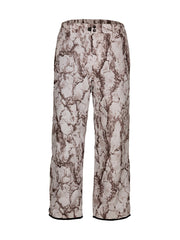 Natural Gear camo snow pants show waterproof, windproof insulation for cold outdoor use.