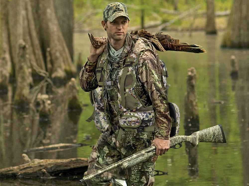 NatureBlend Turkey Vest in action illustrating hands-free sit-and-stay during field hunts