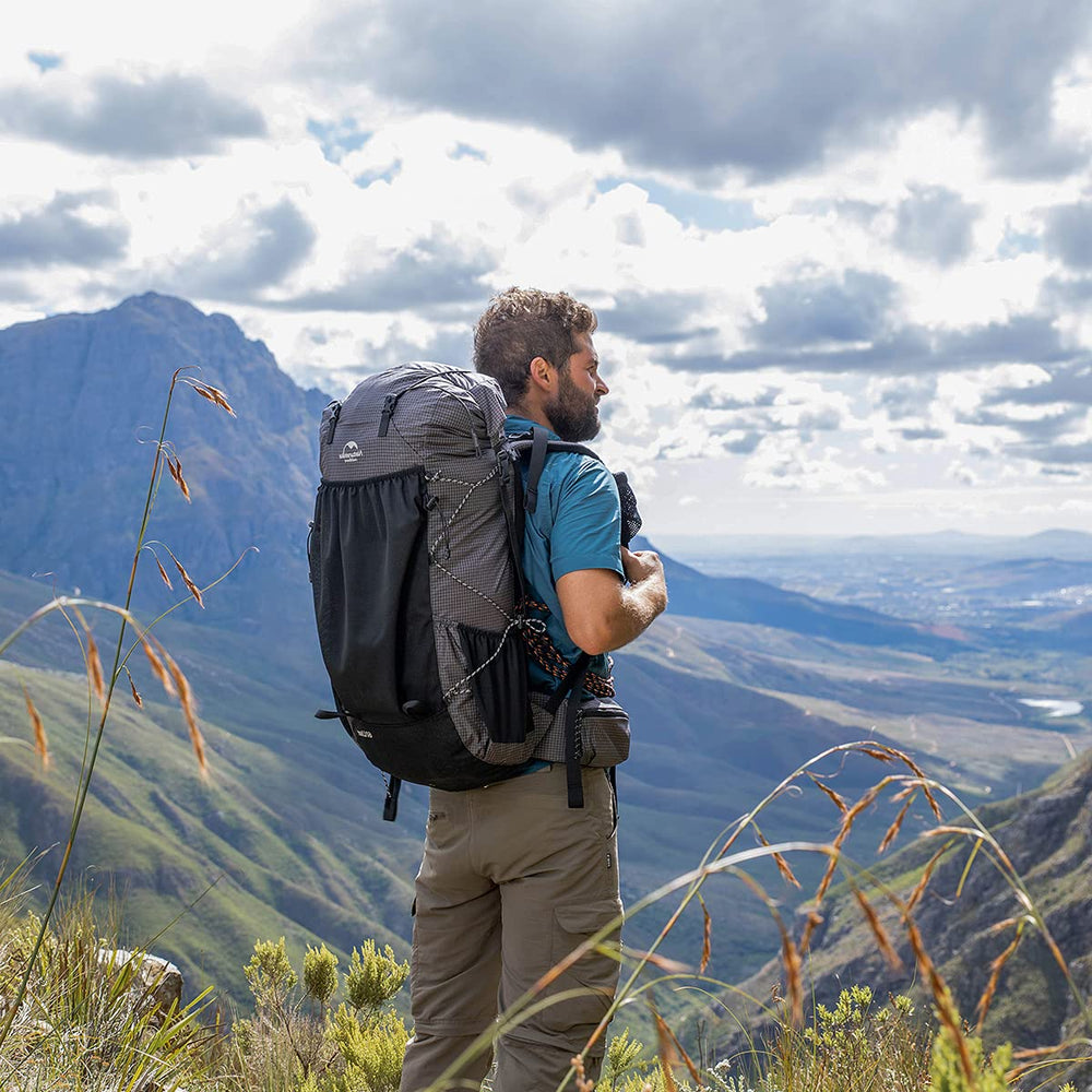 Naturehike 65L durable 420D nylon resists tears and light rain.