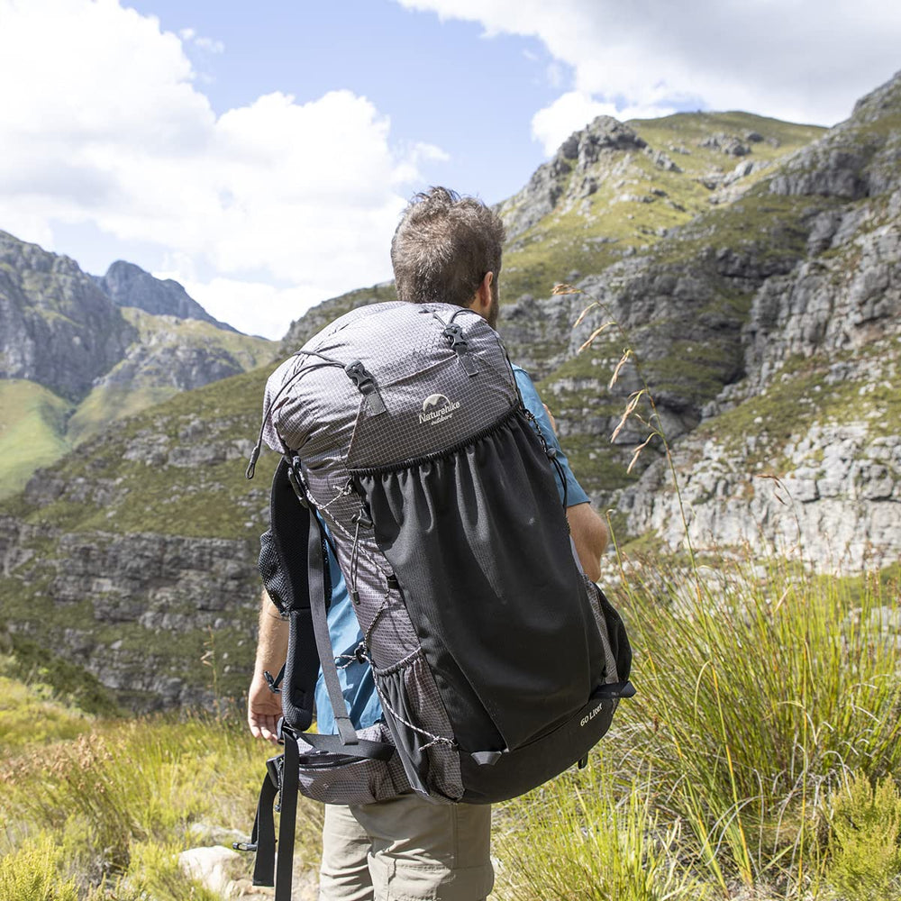 Naturehike 65L hydration system supports on-the-go water access.