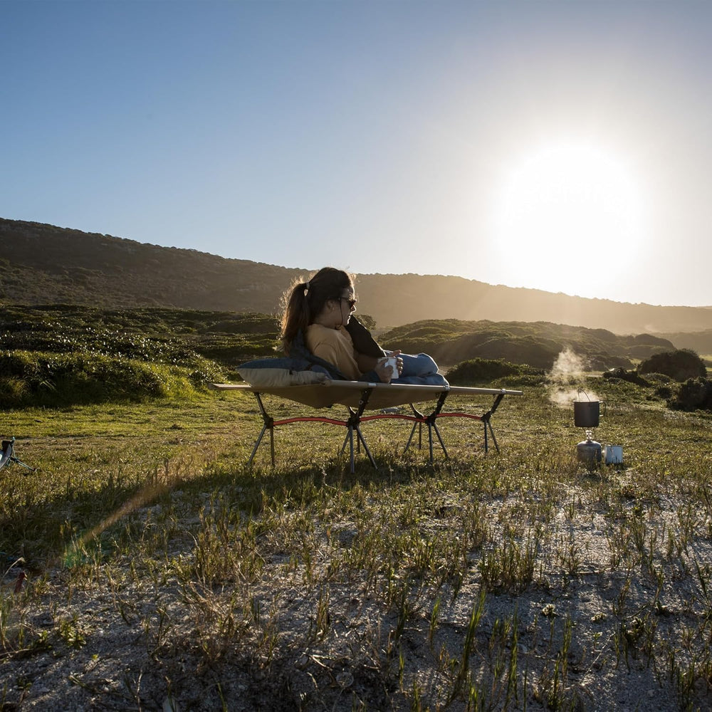 Naturehike ArmyWild cot folded compact for easy transport and storage.