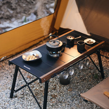 Naturehike Folding IGT Table folded compact for easy transport.