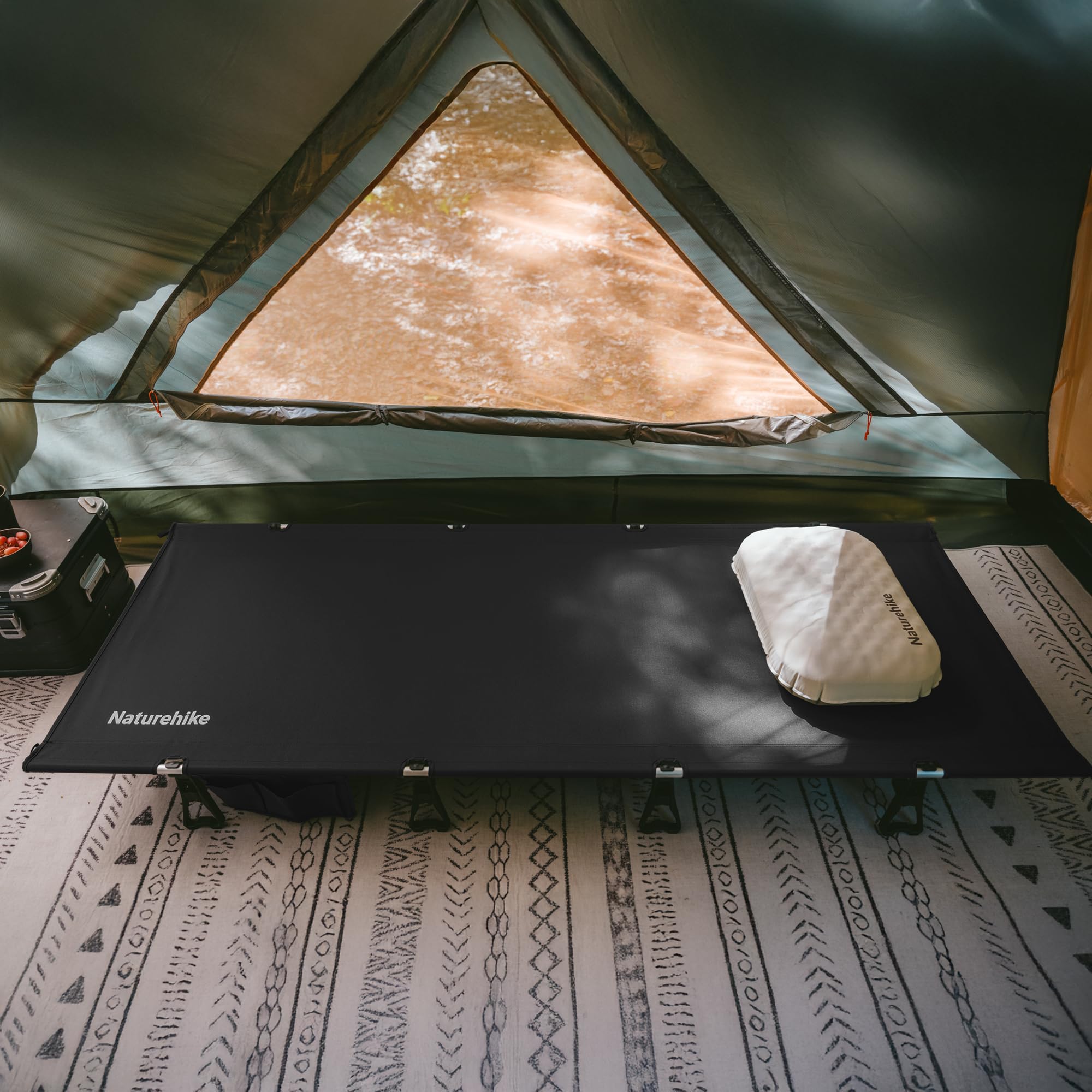 Naturehike GreenWild cot with elevated height for dry ground insulation.