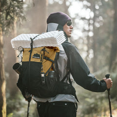 Naturehike hiking backpack roll-top expands capacity for longer adventures.
